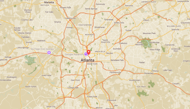 A detailed map highlighting Atlanta, Georgia, showcases the bustling city center and noteworthy spots like Six Flags Over Georgia and Georgia Aquarium. Major highways are clearly marked for easy navigation, assisting travelers in sampling the vibrant surroundings.