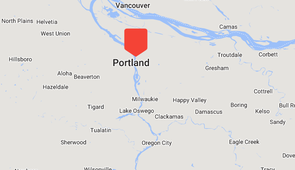 Map showing Portland, Oregon, highlighted with a red marker. Nearby locations include Vancouver, Beaverton, Gresham, and other surrounding areas. Rivers and highways are visible, outlining the geographic region. Perfect for mold testing excursions or sampling the best local sights!